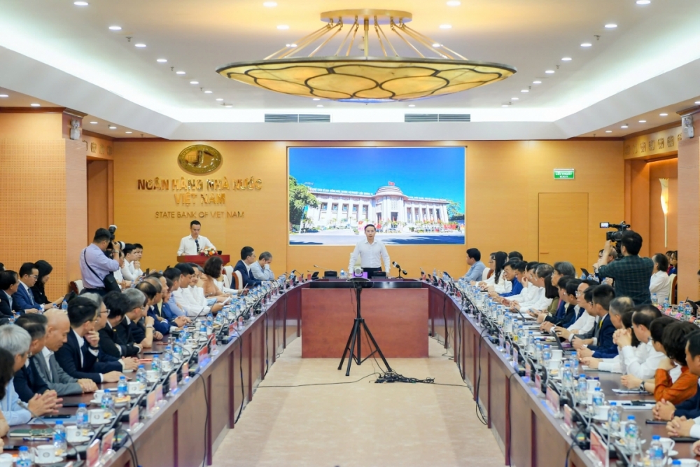 Thống đốc NHNN Phạm Đức Ấn chủ trì cuộc họp. Ảnh: NHNN Thống đốc NHNN Phạm Đức Ấn chủ trì cuộc họp. Ảnh: NHNN