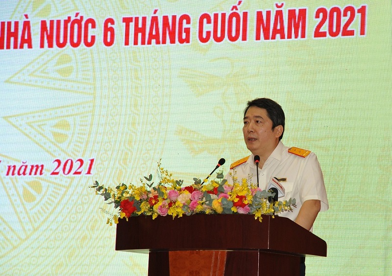 Tổng cục trưởng Tổng cục Thuế Cao Anh Tuấn báo cáo tại hội nghị