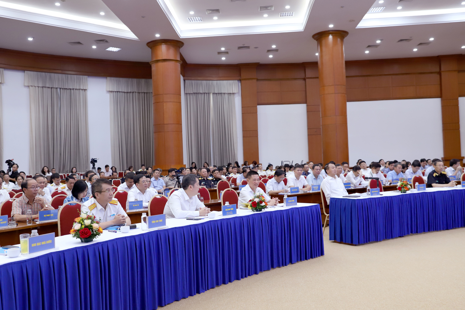 Các đại biểu dự Hội nghị tại điểm cầu Bộ Tài chính. Ảnh: Văn Trường